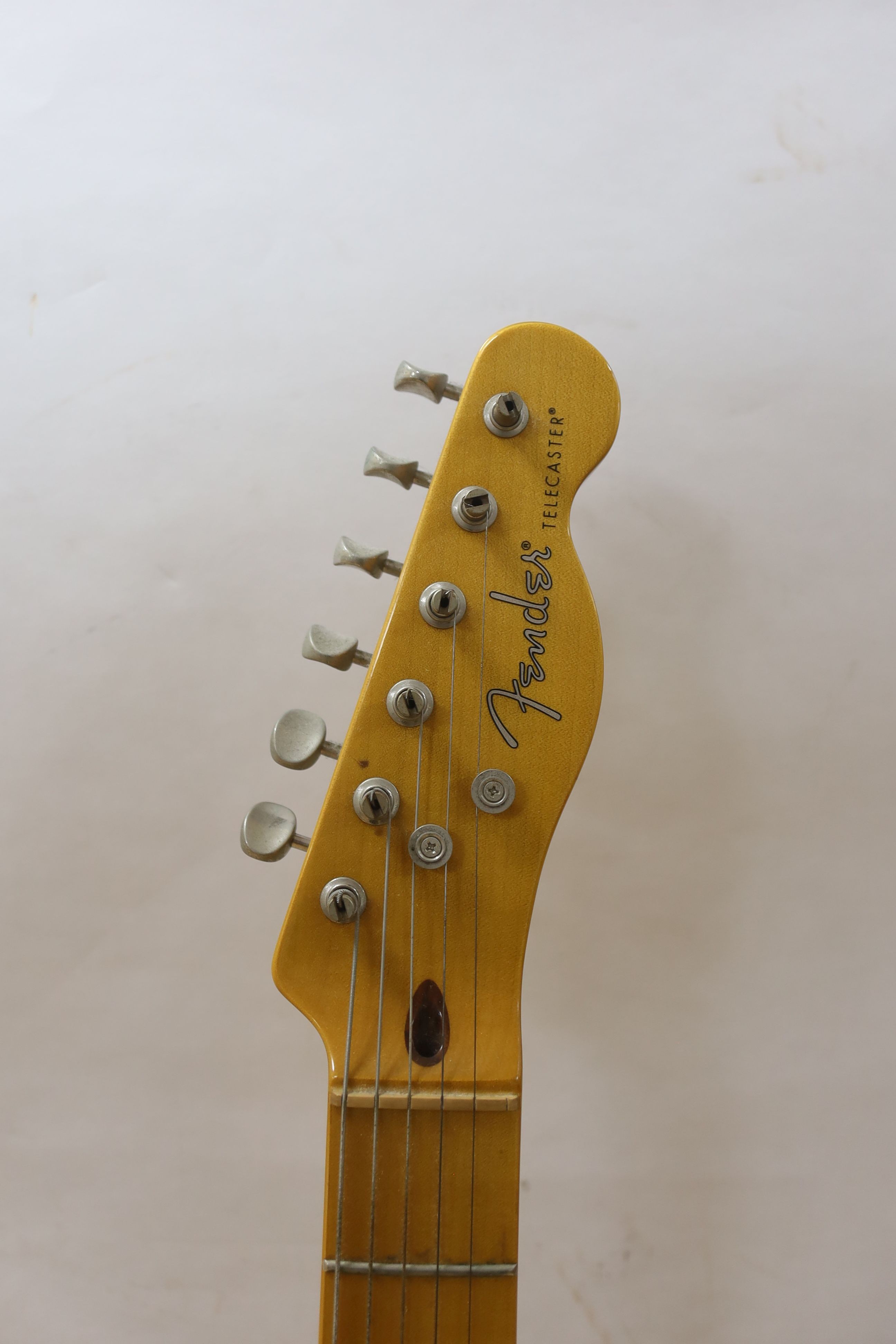 A Fender Telecaster guitar. Serial number CGF1314464